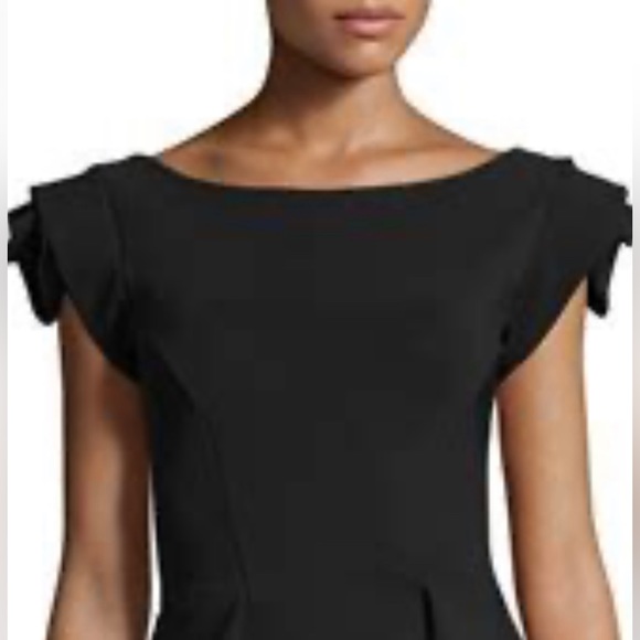 CHIARA BONI LA PETITE ROBE
Black Rosette Rose Flower Sleeve Shoulder Tunic Top - Picture 11 of 12